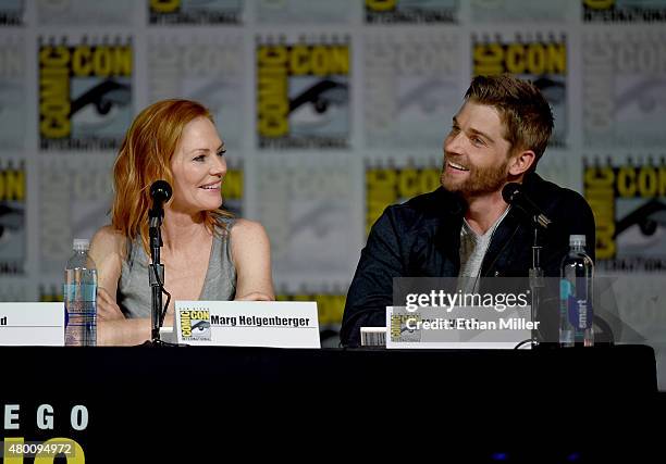 Actress Marg Helgenberger and actor Mike Vogel attends CBS TV Studios' panel for "Under the Dome" during Comic-Con International 2015 at the San...