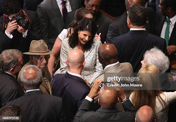 South Carolina Governor Nikki Haley greets people after she signed a bill to remove the Confederate flag from the statehouse on July 9, 2015 in...