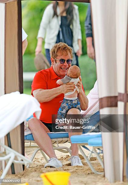 Elton John and baby Zachary Jackson Levon Furnish-John are seen during vacation on February 21, 2011 in Honolulu, Hawaii.