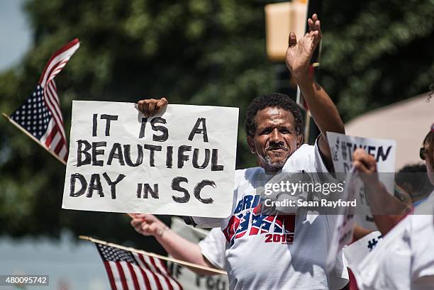 Supporters celebrate after South Carolina Governor Nikki Haley signs a bill to remove the Confederate battle flag from the state house grounds July...