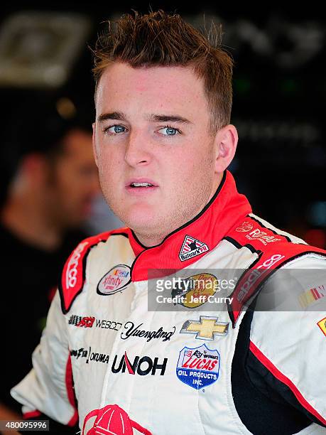 Ty Dillon, driver of the Red Kap/Alsco/Larry Miller Dealership Chevrolet, looks on during practice for the NASCAR XFINITY Series July Kentucky Race...