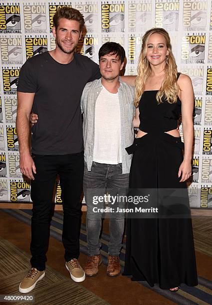Actors Liam Hemsworth, Josh Hutcherson and Jennifer Lawrence of "The Hunger Games: Mockingjay - Part 2" attends the Lionsgate press room during...
