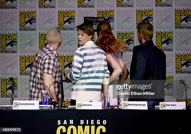 Producer Tim Schlattmann, actor Colin Ford, actress Marg Helgenberger and actor Mike Vogel attend CBS TV Studios' panel for "Under the Dome" during...