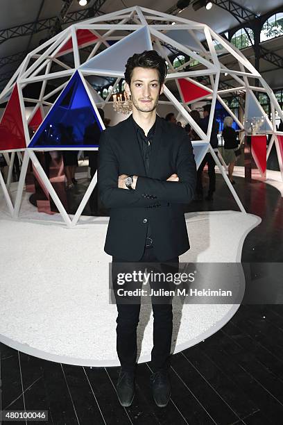 Pierre Niney atends Montblanc Boheme Event Paris at Orangerie Ephemere on July 10, 2015 in Paris, France.