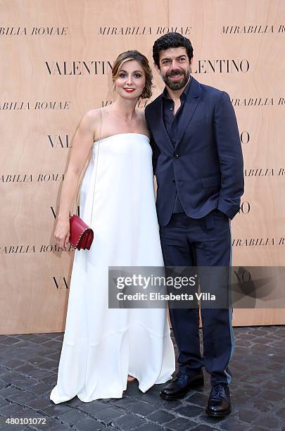 Anna Ferzetti and Pierfrancesco Favino attend the Valentino 'Mirabilia Romae' haute couture collection fall/winter 2015 2016 at Piazza Mignanelli on...
