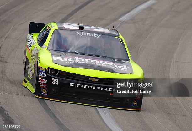 Paul Menard, driver of the Richmond/Menards Chevrolet, drives during practice for the NASCAR XFINITY Series July Kentucky Race at Kentucky Speedway...