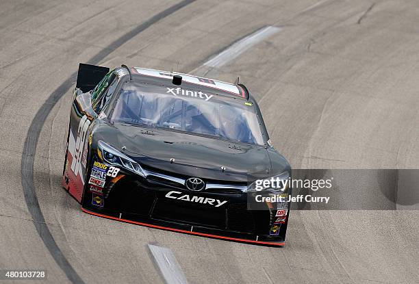 Yeley, driver of the Texas 28 Spirits Stage Toyota, drives during practice for the NASCAR XFINITY Series July Kentucky Race at Kentucky Speedway on...