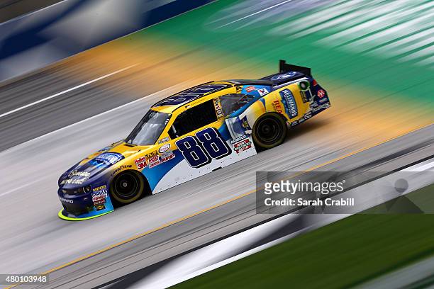 Dale Earnhardt Jr., driver of the Hellmann's Chevrolet, drives during practice for the NASCAR XFINITY Series July Kentucky Race at Kentucky Speedway...
