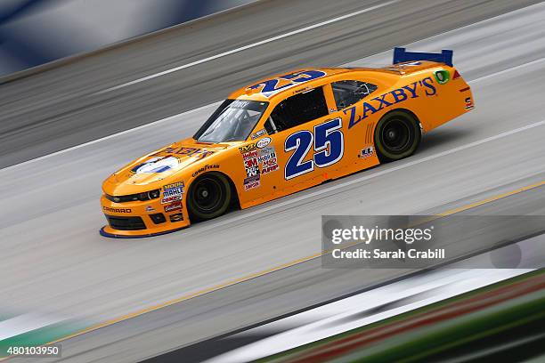 John Wes Townley, driver of the Zaxby's Chevrolet, drives during practice for the NASCAR XFINITY Series July Kentucky Race at Kentucky Speedway on...