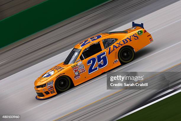 John Wes Townley, driver of the Zaxby's Chevrolet, drives during practice for the NASCAR XFINITY Series July Kentucky Race at Kentucky Speedway on...