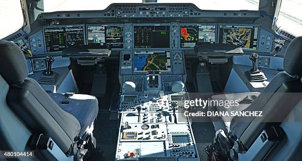 View of the cockpit of the new Airbus A350 XWB during a media presentation at El Dorado airport in Bogota, Colombia on July 9, 2015. AFP PHOTO/Diana...
