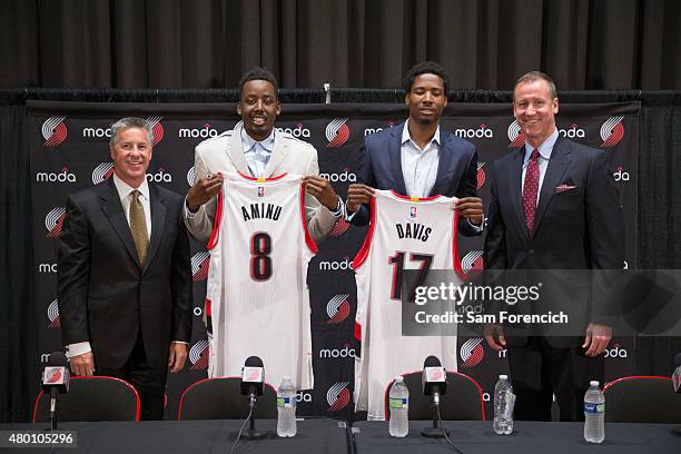 General Manager Neil Olshey and Head Coach Terry Stotts of the Portland Trail Blazers welcome new players Al-Farouq Aminu and Ed Davis during a press...