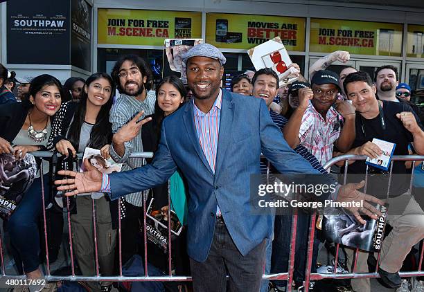 Lennox Lewis attends the Canadian Premiere of 'Southpaw' at Scotiabank Theatre on July 9, 2015 in Toronto, Canada.