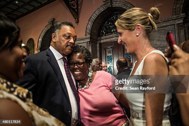 The Rev. Jesse Jackson gets a hug from state Rep. Gilda Cobb-Hunter July 9, 2015 in Columbia, South Carolina. Debate on the flag was reignited three...