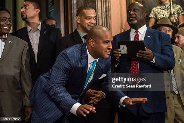 State Rep. Todd Rutherford talks with colleagues in the South Carolina state house July 9, 2015 in Columbia, South Carolina. Governor Nikki Haley...