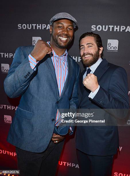 Lennox Lewis and Jake Gyllenhaal attend the Canadian Premiere of 'Southpaw' at Scotiabank Theatre on July 9, 2015 in Toronto, Canada.