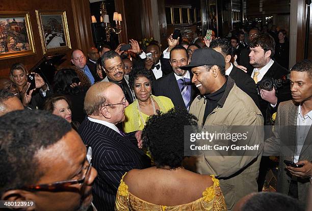 Clive Davis, Aretha Franklin, Denzel Washington and Kecalf attend Aretha Franklin's 72nd Birthday Celebration at The Ritz-Carlton Hotel on March 22,...