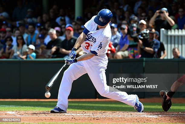 Los Angeles Dodgers leftfielder Mike Baxter bats against the Arizona Diamondbacks in their Major League Baseball game at the Sydney Cricket Ground in...