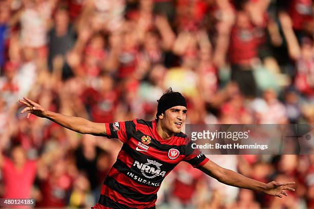 Jerome Polenz of the Wanderers celebrates after scoring during the round 24 A-League match between the Western Sydney Wanderers and Perth Glory at...