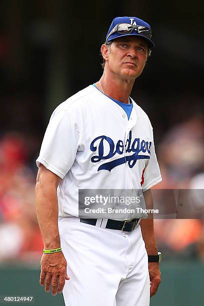 Dodgers manager, Don Mattingly walks from the field during the MLB match between the Los Angeles Dodgers and the Arizona Diamondbacks at Sydney...