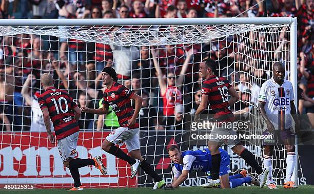 Jerome Polenz of the Wanderers celebrates his goal with team-mates during the round 24 A-League match between the Western Sydney Wanderers and Perth...