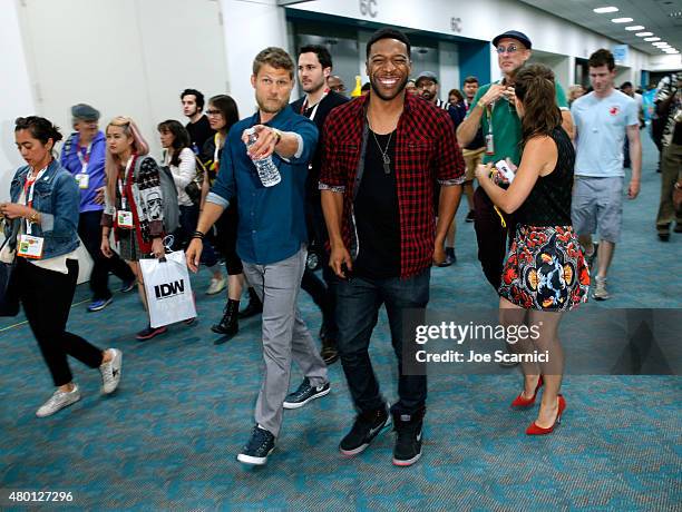 Actors Travis Van Winkle, Jocko Sims and Marissa Neitling attend "The Last Ship" press room during TNT at Comic-Con International: San Diego 2015 on...