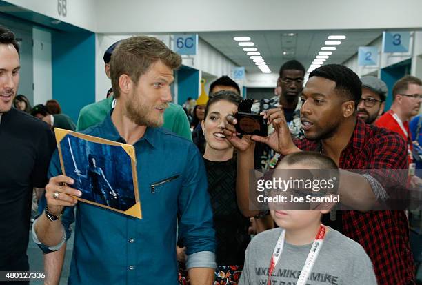 Actors Travis Van Winkle, Marissa Neitling and Jocko Sims attend "The Last Ship" press room during TNT at Comic-Con International: San Diego 2015 on...