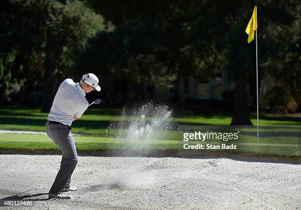 Jim Knous hits from a bunker on the ninth hole during the first round of the Web.com Tour Albertsons Boise Open presented by Kraft Nabisco at...