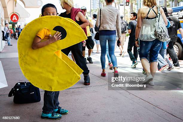 Boy wearing a Pac-Man costume attends the Comic-Con International convention in San Diego, California, U.S., on Thursday, July 9, 2015. Comic-Con...