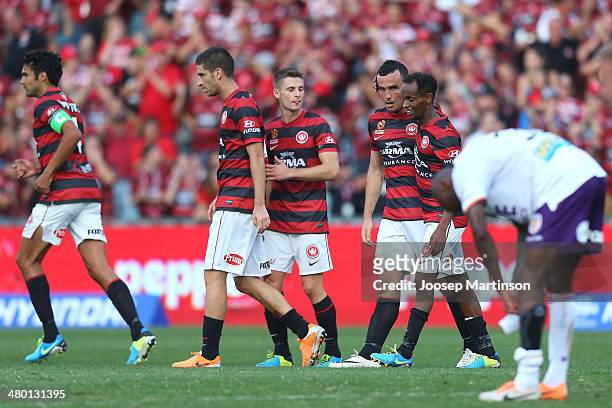 Mark Bridge of the Wanderers celebrates his goal with team-mates during the round 24 A-League match between the Western Sydney Wanderers and Perth...