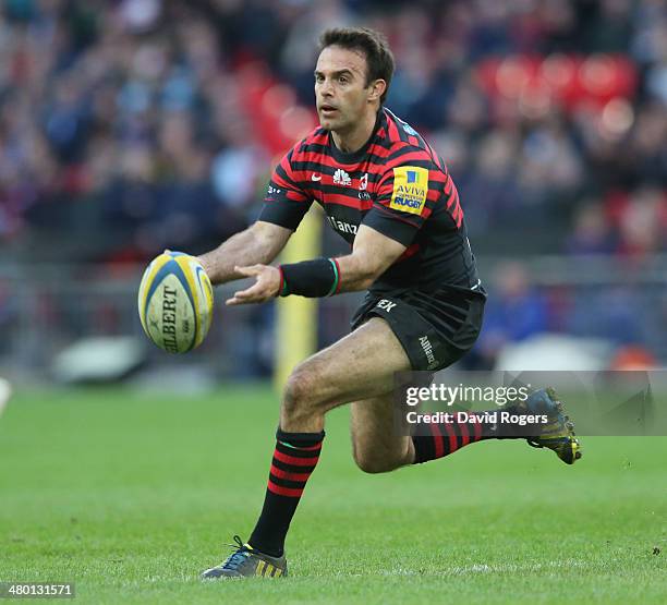 Neil de Kock of Saracens passes the ball during the Aviva Premiership match between Saracens and Harlequins at Wembley Stadium on March 22, 2014 in...