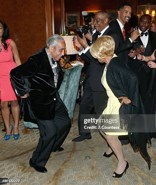 Congressman Charles B. Rangel dances with a guest at Aretha Franklin's 72nd Birthday Celebration at the Ritz Carlton on March 22, 2014 in New York...