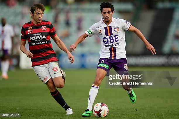 Ryan Edwards of Perth runs with the ball during the round 24 A-League match between the Western Sydney Wanderers and Perth Glory at Parramatta...