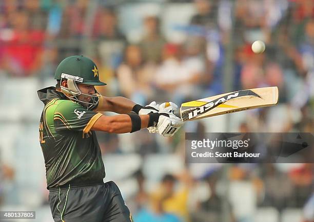 Kamran Akmal of Pakistan hits a boundary during the ICC World Twenty20 Bangladesh 2014 match between Australia and Pakistan at Sher-e-Bangla Mirpur...