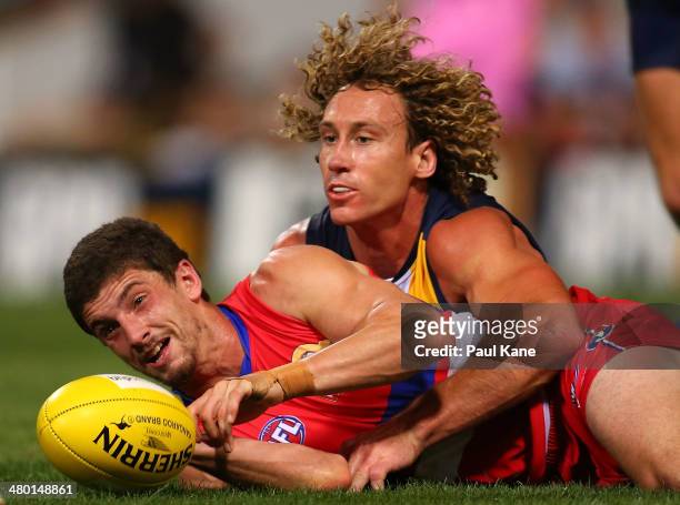 Tom Liberatore of the Bulldogs and Matt Priddis of the Eagles contest for the ball during the round one AFL match between the West Coast Eagles and...