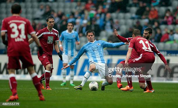 Julian Weigl of Muenchen challenges Chris Loewe , Srdjan Lakic , Ruben Jenssen and Markus Karl of Kaiserslautern during the Second Bundesliga match...