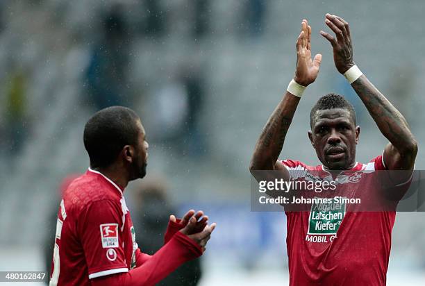 Olivier Occean and Mohamadou Idrissou of Kaiserslautern celebrate after the Second Bundesliga match between TSV 1860 Muenchen and 1. FC...