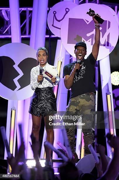 Actress Lyndie Greenwood and actor Orlando Jones present an award during the MTV Fandom Fest San Diego Comic-Con at PETCO Park on July 9, 2015 in San...