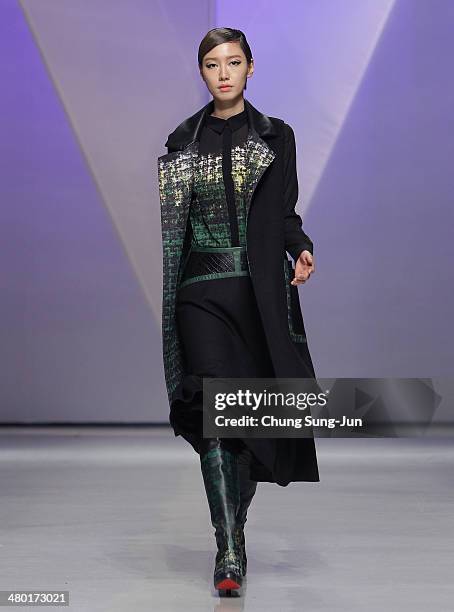 Model showcases designs on the runway during the Lie Sang Bong show as part of Seoul Fashion Week F/W 2014 on March 23 in Seoul, South Korea.