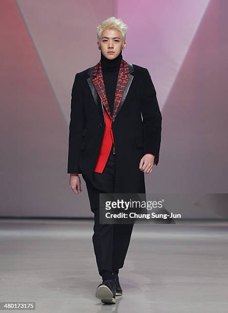 Model showcases designs on the runway during the Lie Sang Bong show as part of Seoul Fashion Week F/W 2014 on March 23 in Seoul, South Korea.