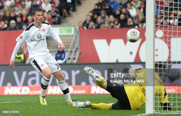 Alexander Madlung of Frankfurt scores his team's third goal during the Bundesliga match between 1. FC Nuernberg and Eintracht Frankfurt at Grundig...