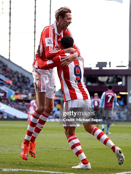 Peter Odemwingie of Stoke celebrates with teammate Peter Crouch after scoring a goal to level the scores at 1-1 during the Barclays Premier League...