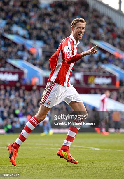 Peter Crouch of Stoke celebrates after scoring his team's second goal during the Barclays Premier League match between Aston Villa and Stoke City at...