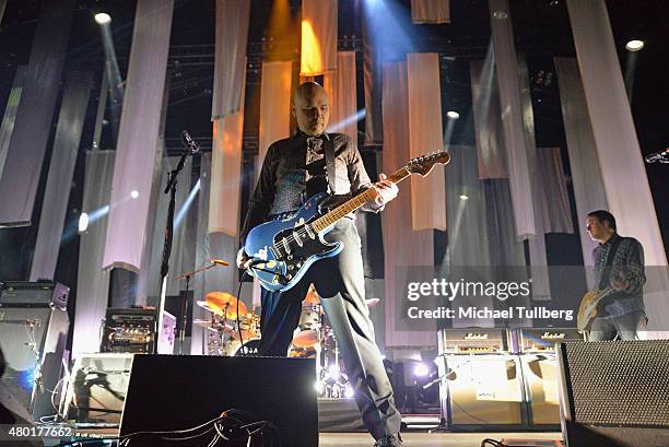 Musicians Billy Corgan and Jeff Schroeder of Smashing Pumpkins perform at Verizon Wireless Amphitheater on July 9, 2015 in Irvine, California.