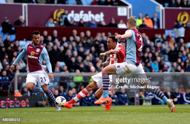 Steven N'Zonzi of Stoke scores his team's third goal during the Barclays Premier League match between Aston Villa and Stoke City at Villa Park on...