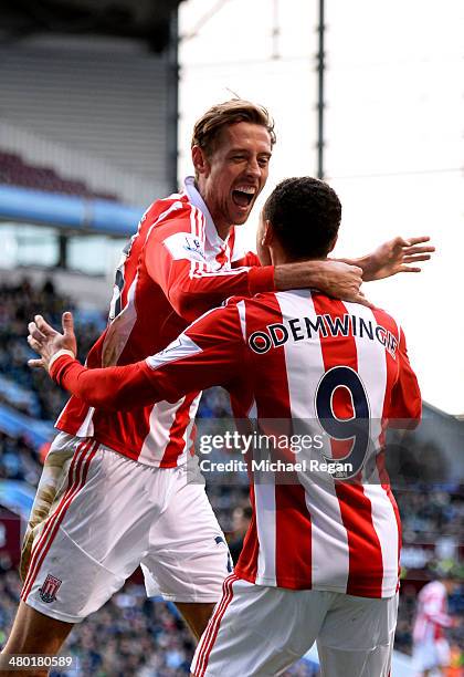 Peter Odemwingie of Stoke celebrates with teammate Peter Crouch after scoring a goal to level the scores at 1-1 during the Barclays Premier League...