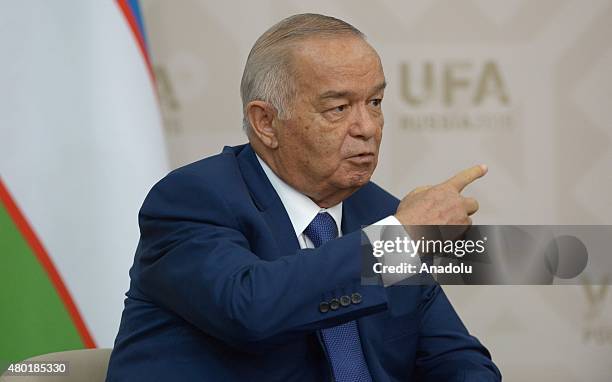 President of Uzbekistan Islam Karimov meets with Russian President Vladimir Putin at the Shanghai Cooperation Organization summit in Ufa on July 10,...