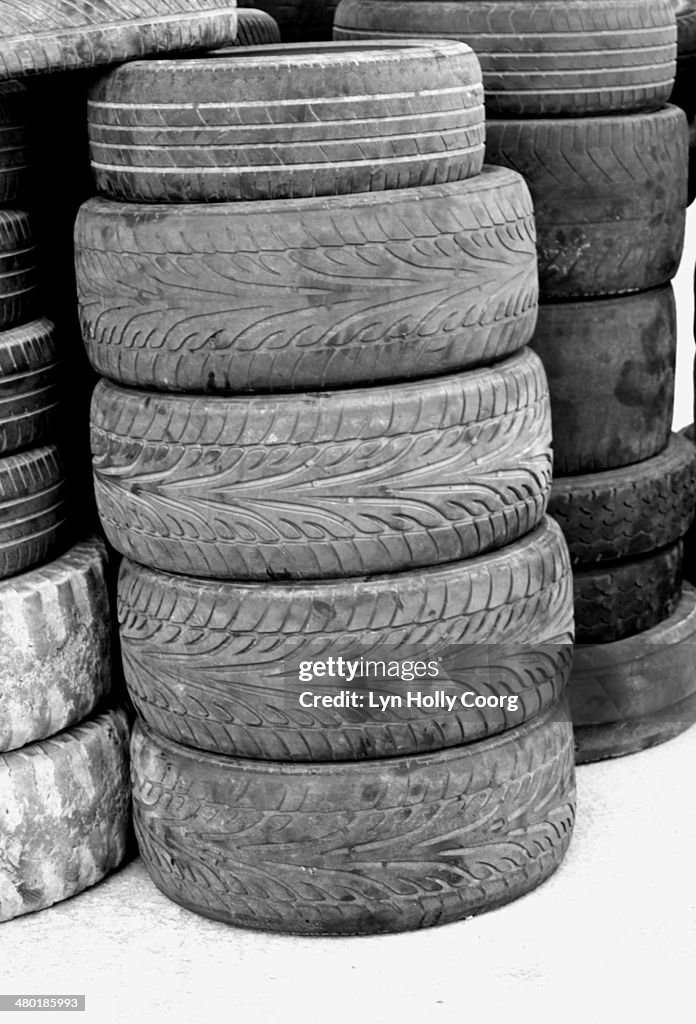 Old tyres stacked up in a pile