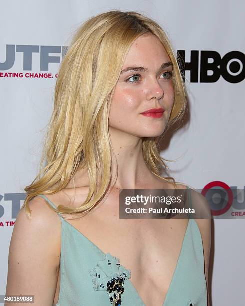 Actress Elle Fanning attends the opening night gala of "Tig" at the 2015 Outfest LGBT Film Festival at Orpheum Theatre on July 9, 2015 in Los...