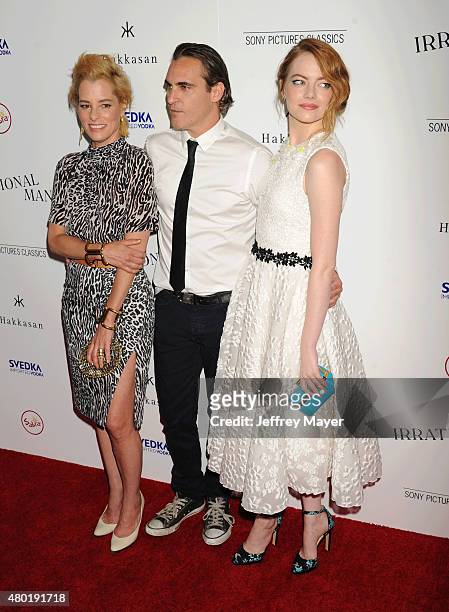 Actors Parker Posey, Joaquin Phoenix and Emma Stone arrive at the Premiere Of Sony Pictures Classics' 'Irrational Man' at the WGA Theatre on July 9,...